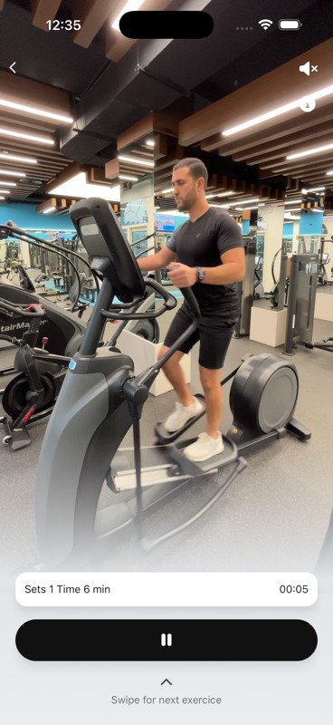 LYAAQA app guided workout player showing a live elliptical machine exercise